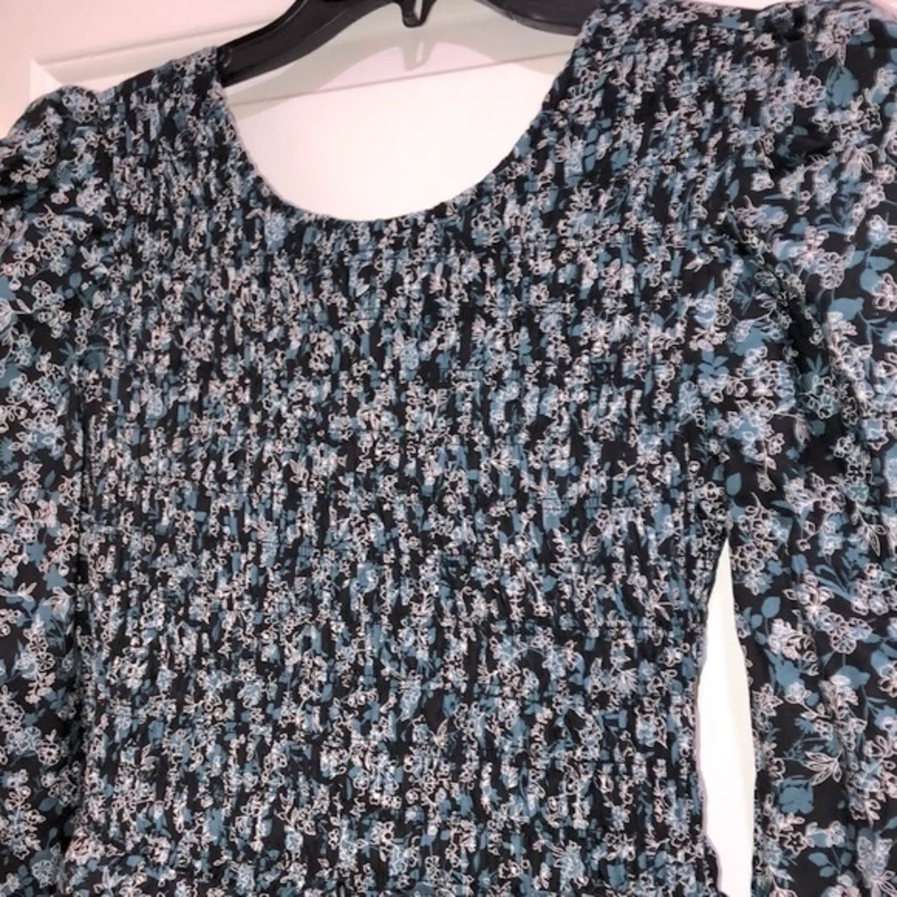 The Polly dress ditzy floral smocked boho dress size medium new with tags